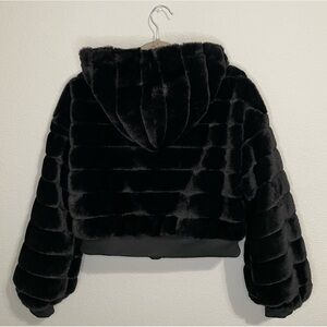 Black fur coat with hood